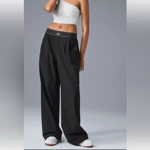 ALO Yoga BLUE  Suit Up Trousers we cut the size marker but we never wore this .